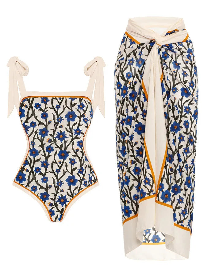 Women's printed chiffon two-piece swimsuit set with a separate hip skirt.