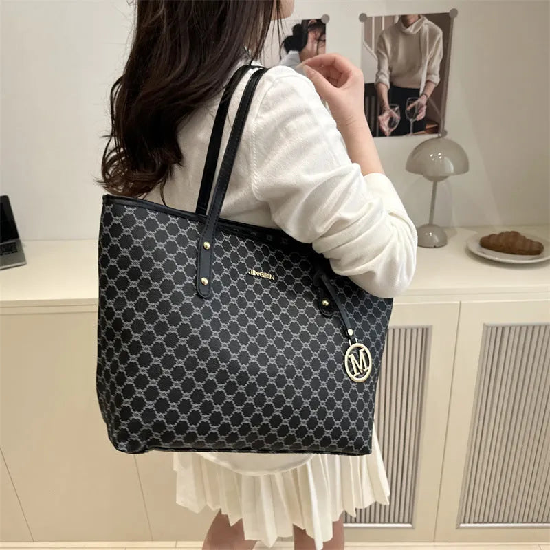 Western style black PU leather shoulder bag with sewing thread details and structured design