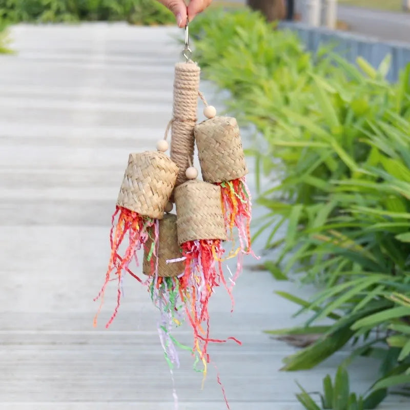 Natural wood and sisal rope parrot foraging toy with colourful shredded paper measuring 15cm by 35cm