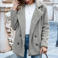 Women's fluffy loose lapel button coat in a range of colours on a size chart background.