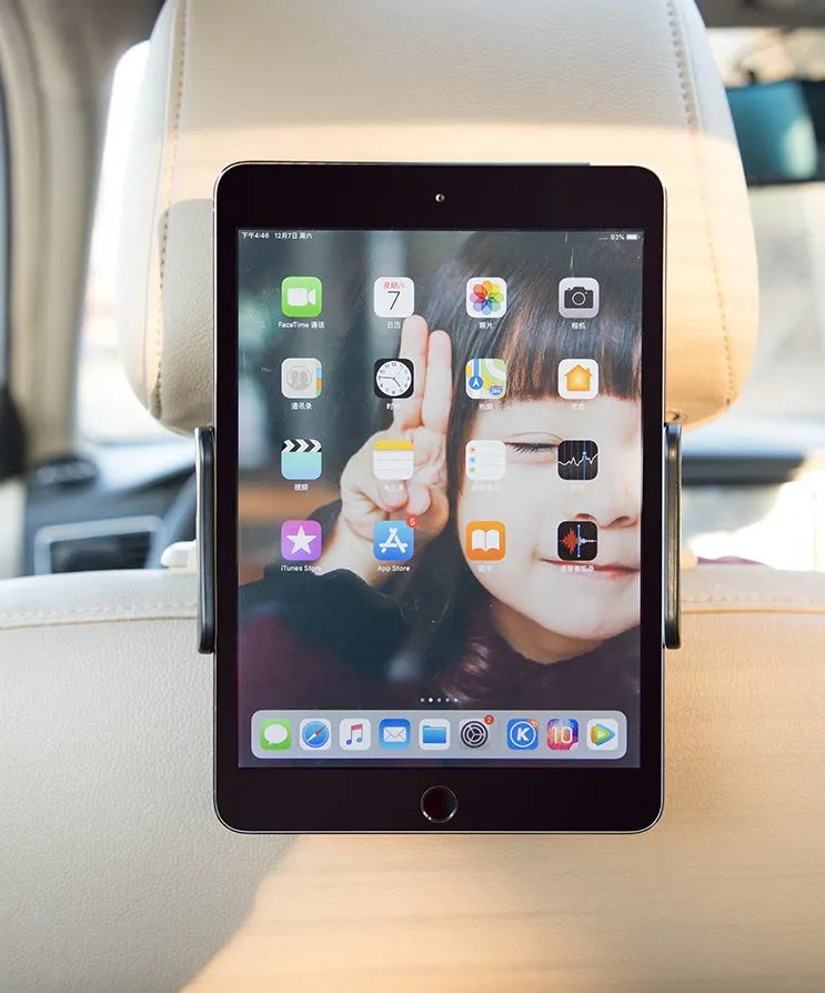 Black universal car phone and tablet holder mounted on a car rear seat base.