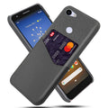 Black leather Google Pixel phone case back cover on a table.