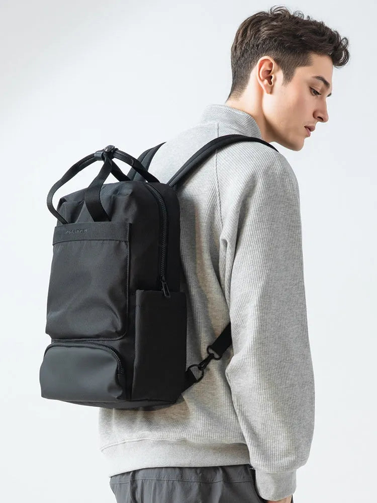Elegant black computer backpack with Oxford cloth exterior and 20-35L capacity
