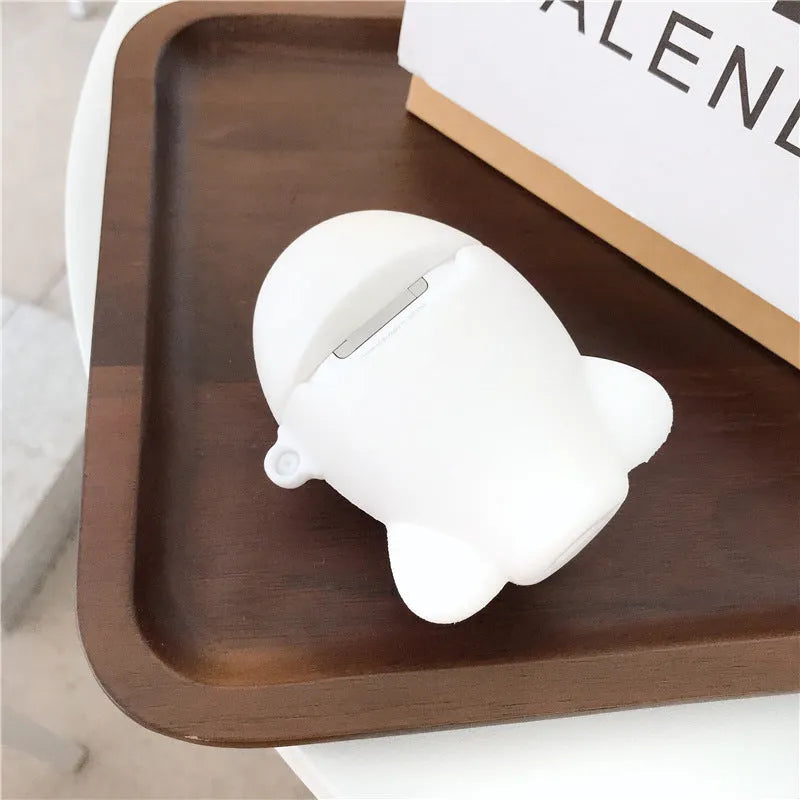 Silicone AirPods protective case with flip-top design, cartoon airplane graphics, and integrated carrying hook