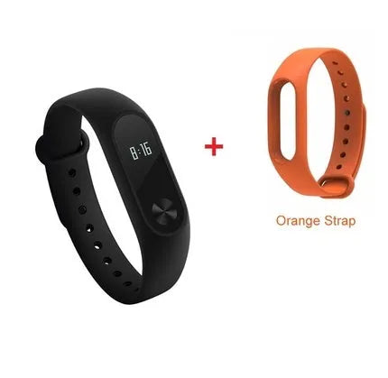 Black Xiaomi Mi Band 2 fitness tracker on wrist showing OLED display with heart rate data.