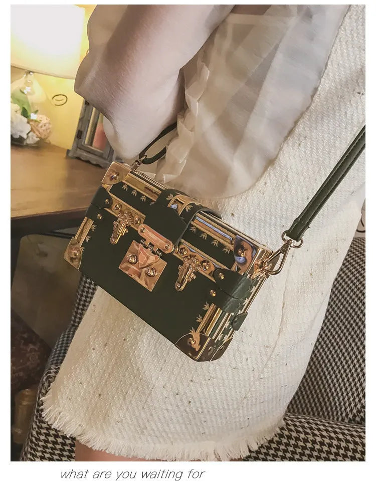 Women's black PU leather shoulder bag with flap closure and decorative rivets