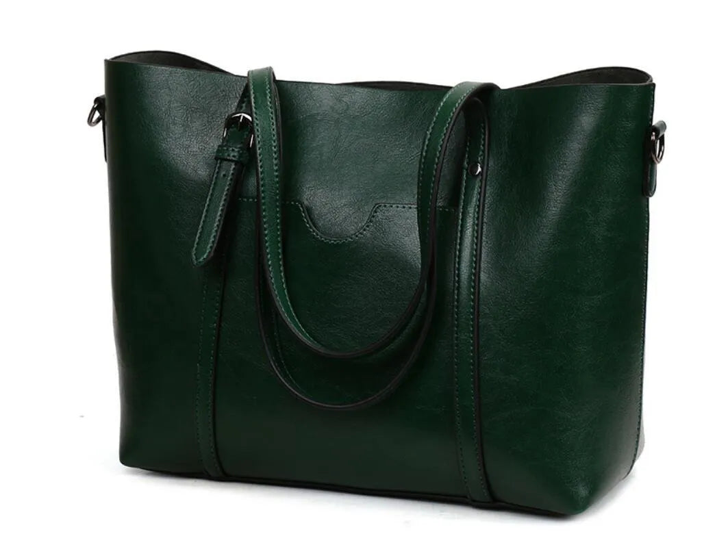 Retro messenger bag for women showing coffee colour option with A4 magazine for scale