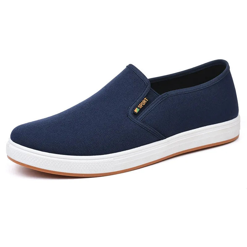 Men's low-top canvas slip-on shoes in BK Black colour with round toe design