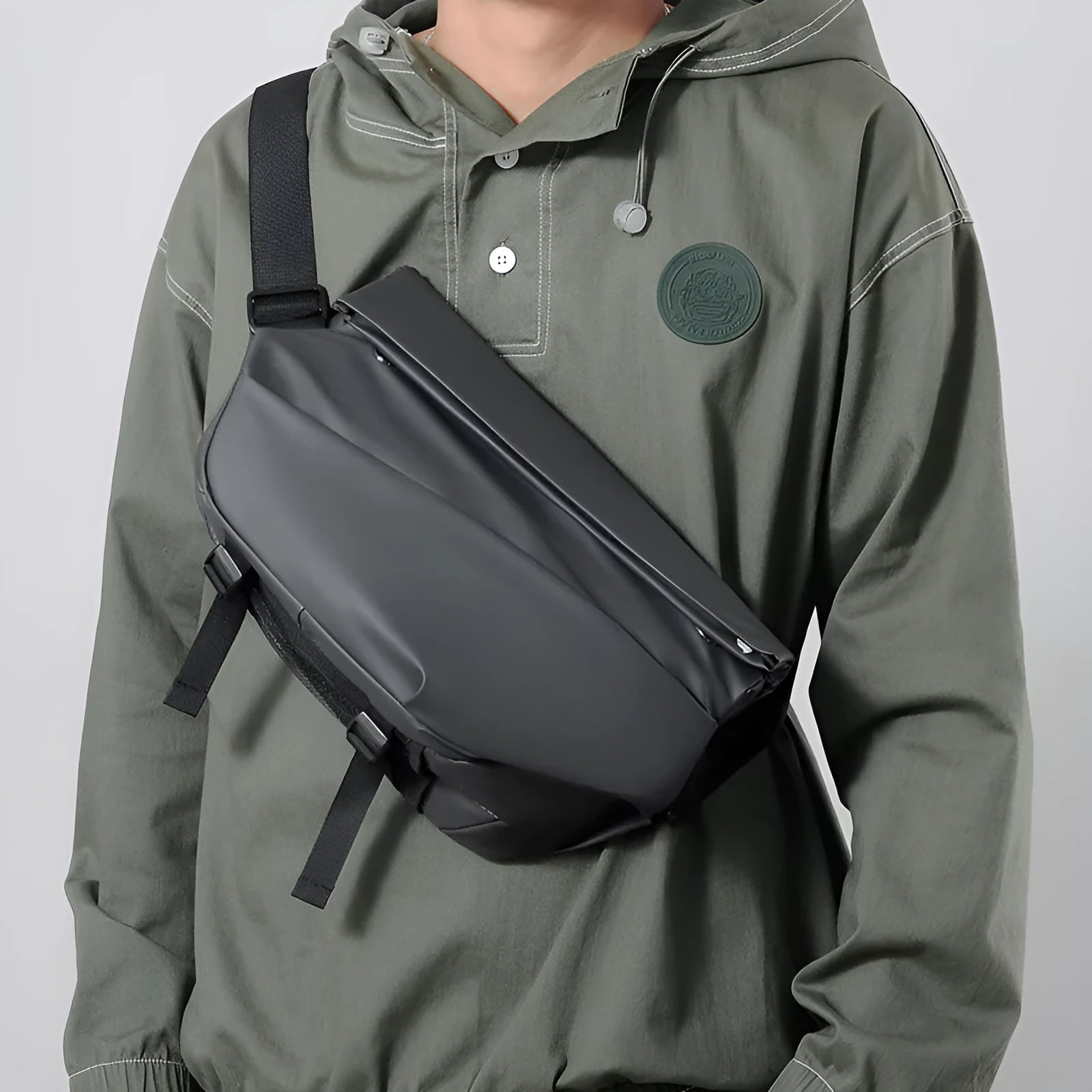 Grey PU leather men's crossbody bag showing internal phone and document compartments