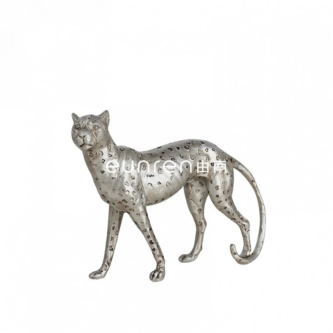 Resin leopard ornament in American Leopard colour on wooden shelf