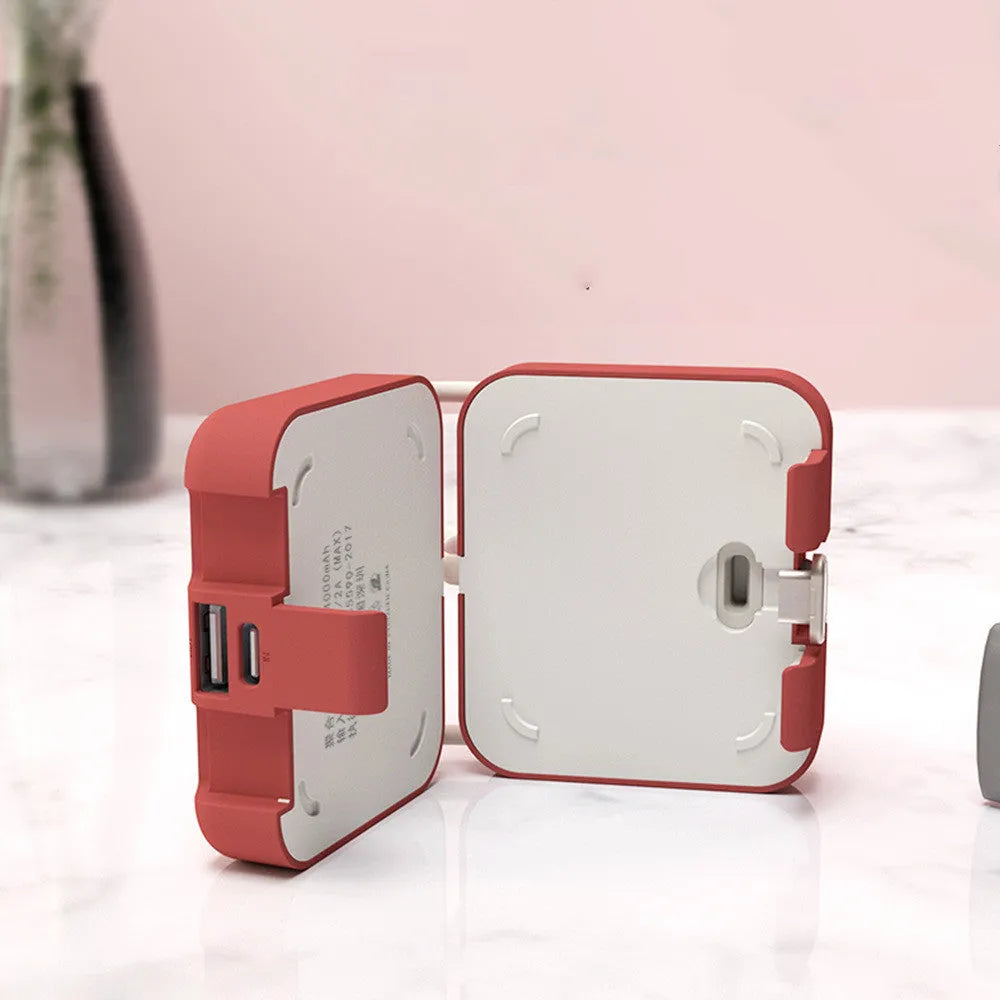 Handbag back clip power bank in blue showing clip, phone stand function, and type-c/USB-A charging ports