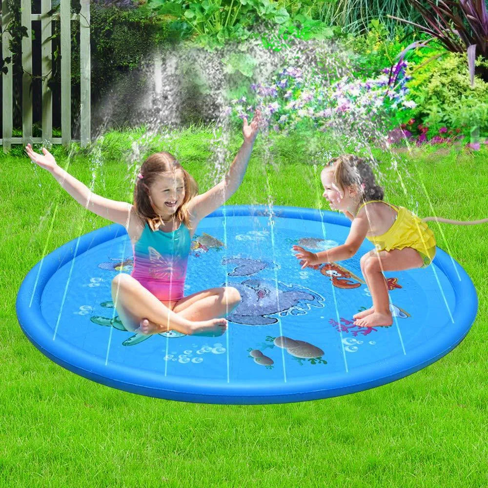 Blue PVC children's water spray mat with marine animal designs laid on grass