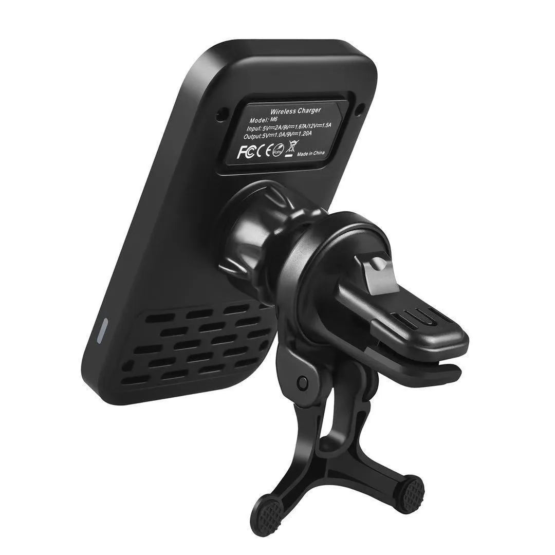 Black M6 magnetic wireless car charger mounted on vehicle air vent with phone attached