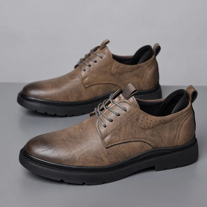 Men's black leather sneakers with decorative sewing lines and rubber sole shown in size 42