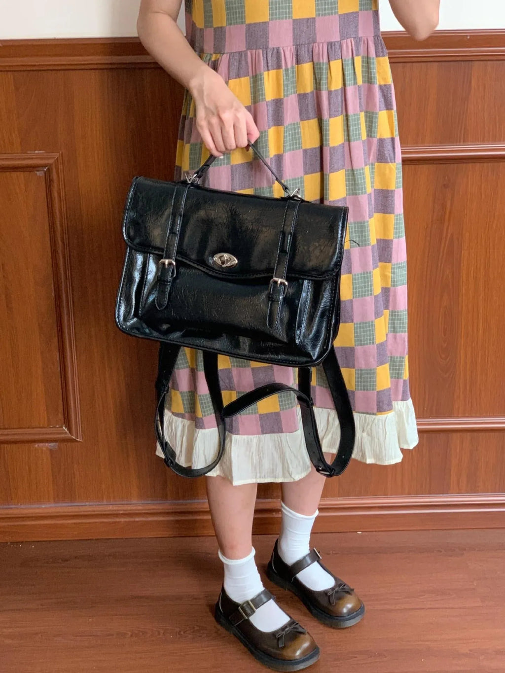 Black college style messenger bag for women with oil wax PU leather finish showing 35cm length dimensions