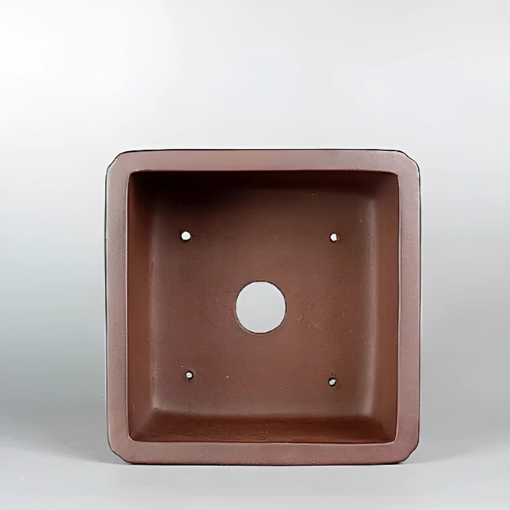 Brown handmade antique purple clay flower pot for indoor plants