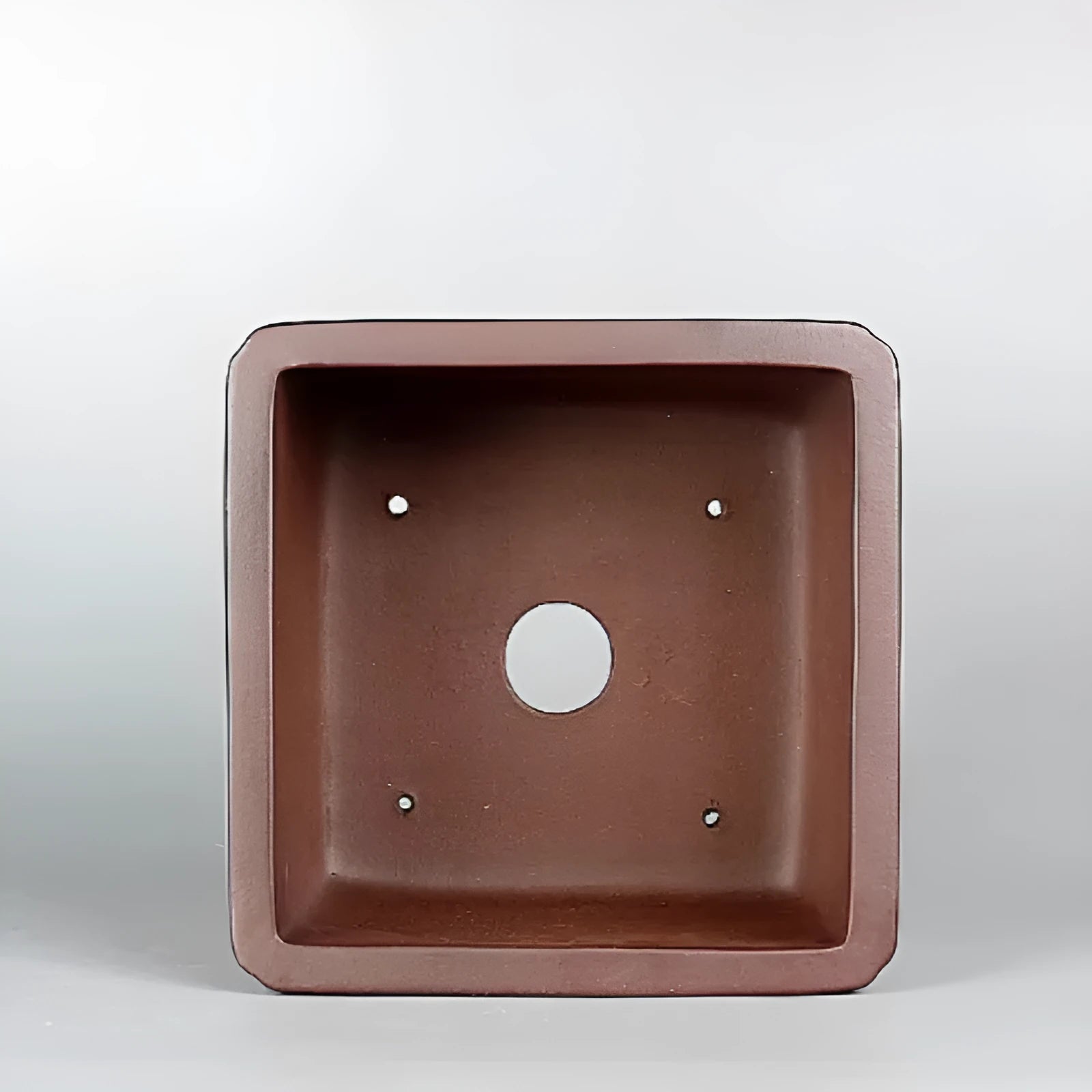Brown handmade antique purple clay flower pot for indoor plants
