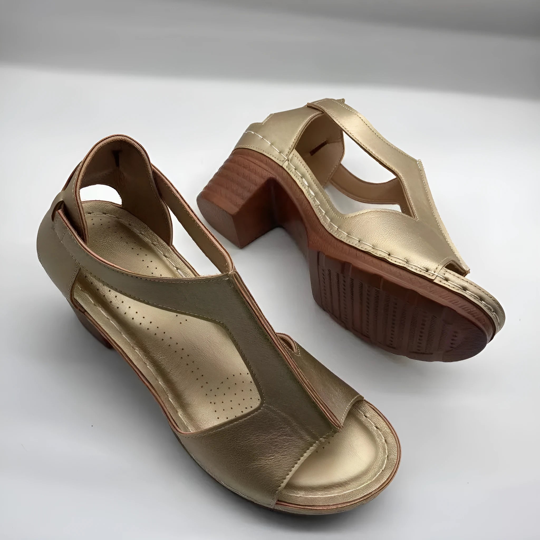 Women's white peep toe wedge sandals with Roman style buckle and low heel