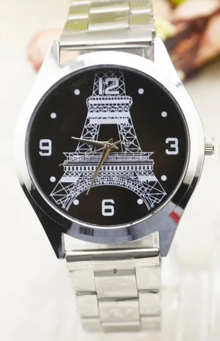 Eiffel Tower design on the white dial of a stainless steel quartz watch for men or women