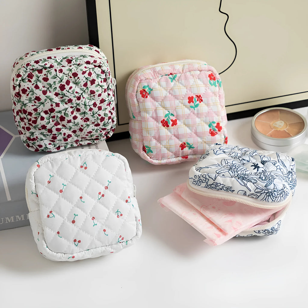 Breathable polyester key storage bag showing multiple floral and cherry pattern options including white background designs