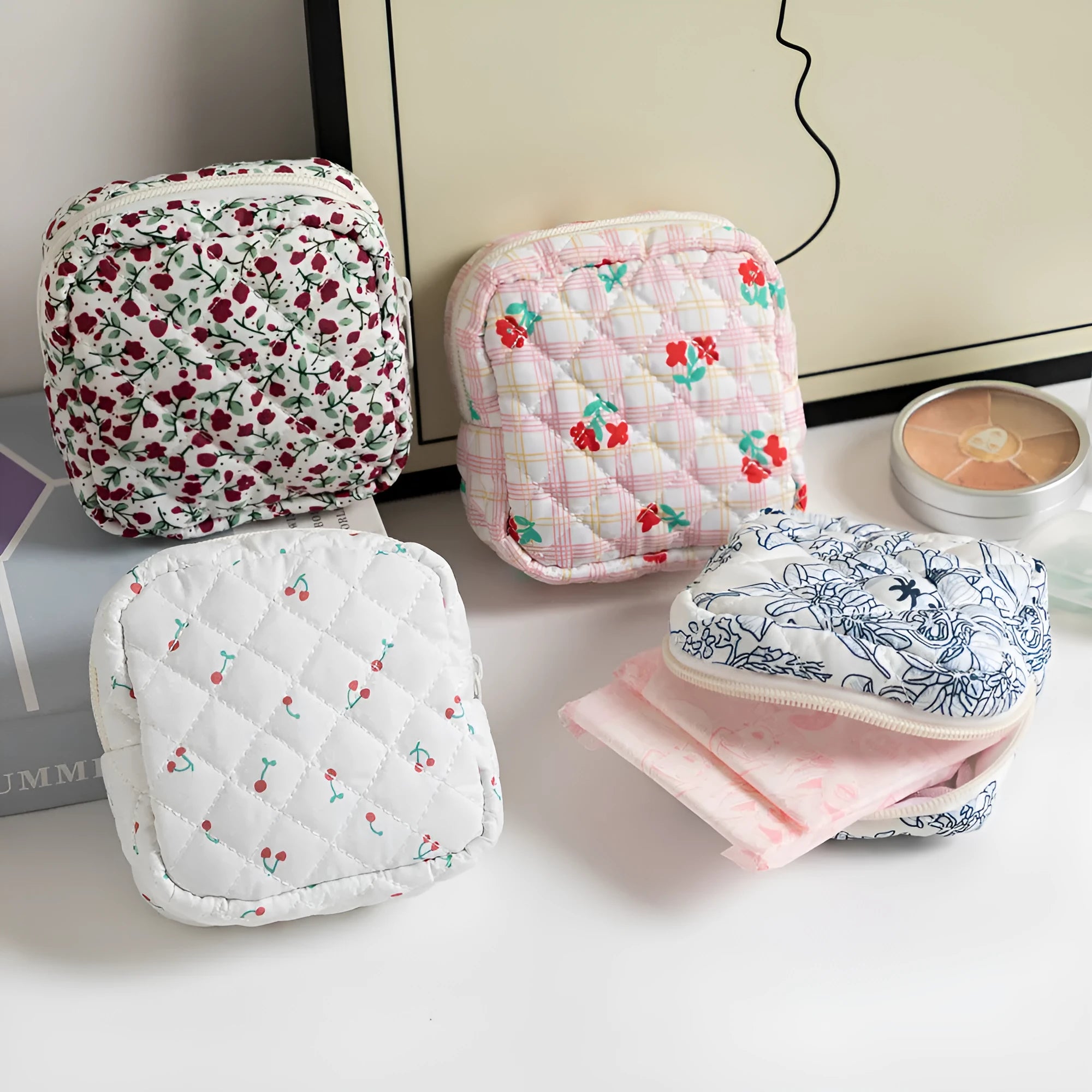 Breathable polyester key storage bag showing multiple floral and cherry pattern options including white background designs