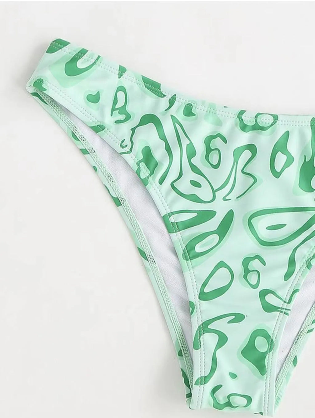 Green floral bandeau bikini swimsuit with backless design and matching briefs