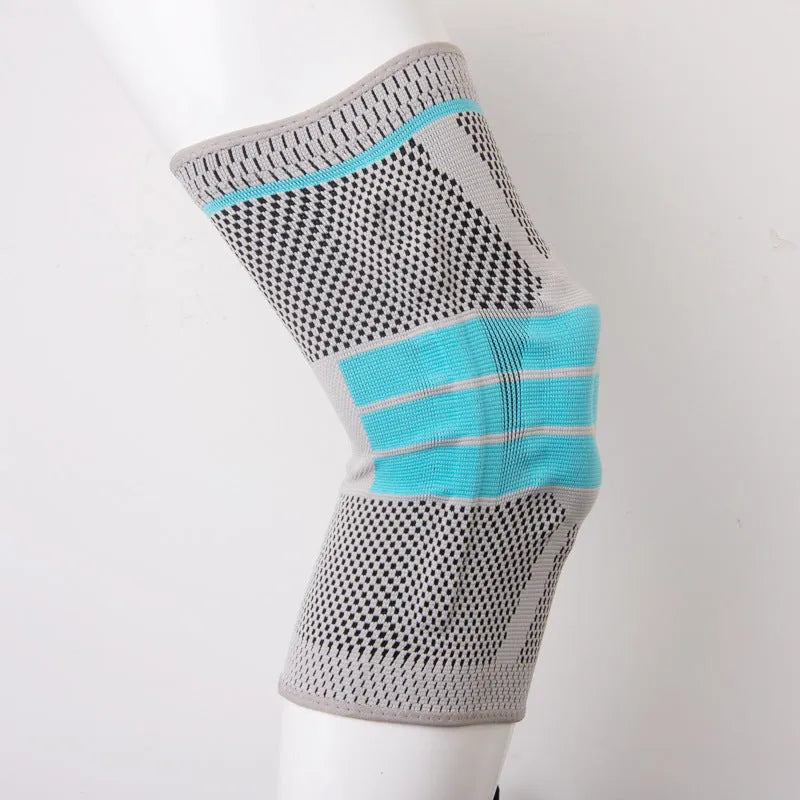 Sky blue silicone basketball knee pads with elastic fibre construction shown in knee sleeve design