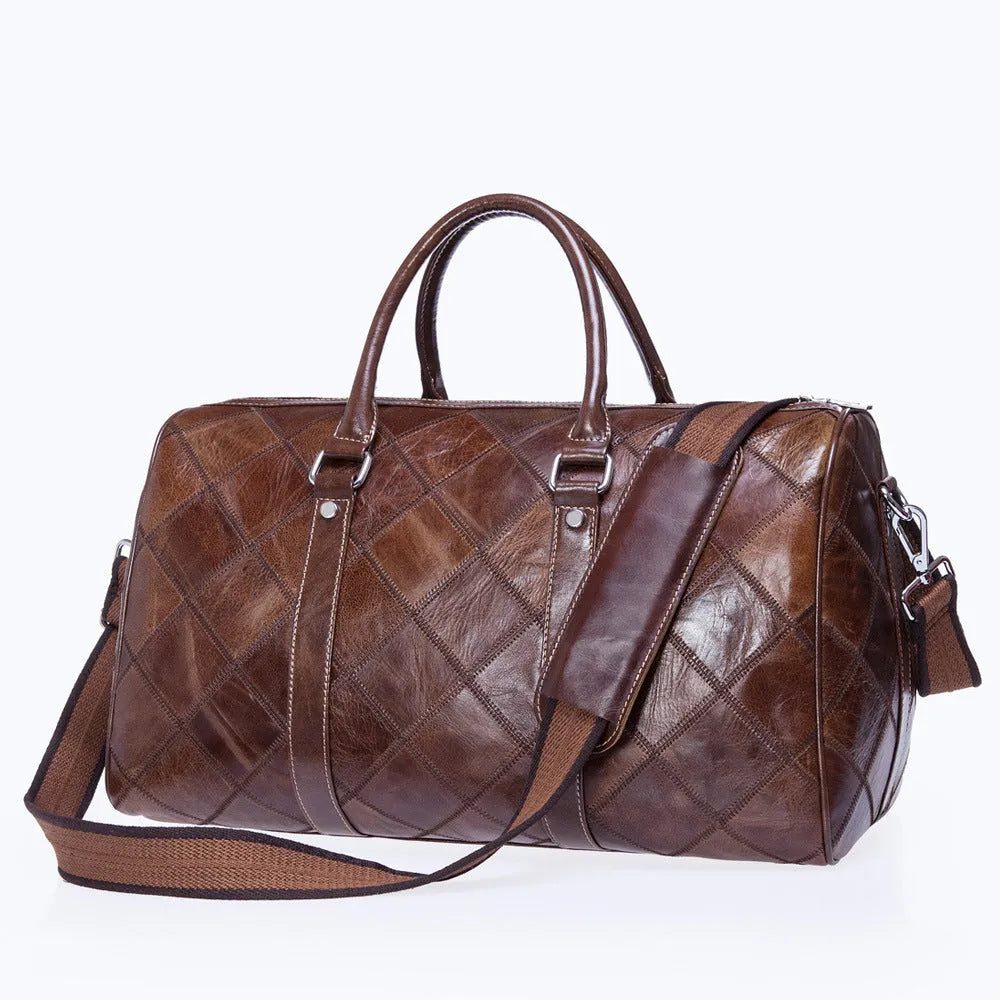 Vintage brown cowhide leather men's duffel bag with a single strap, shown open to reveal internal phone and ID pockets.