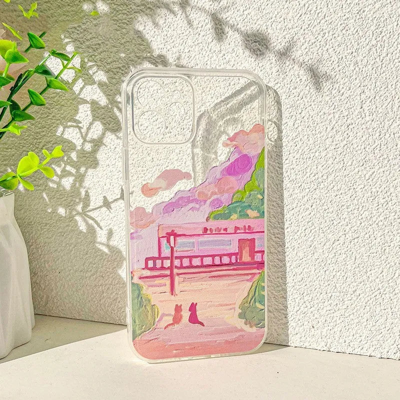 Soft silicone mobile phone case for iPhone with a colourful cartoon design of two cats on the back.