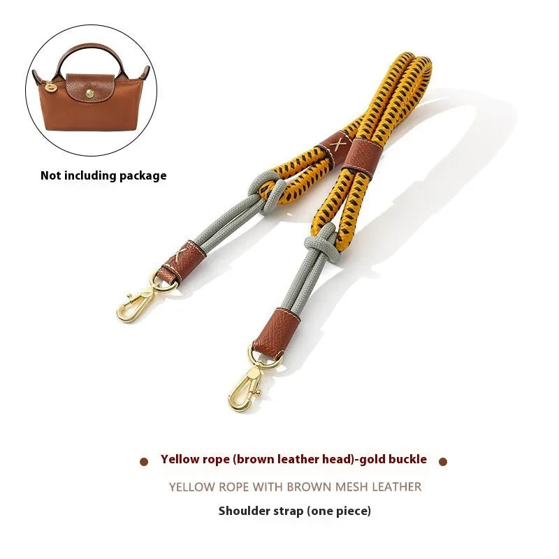 Braided nylon and cowhide leather crossbody shoulder strap with gold alloy buckle on a grey background.