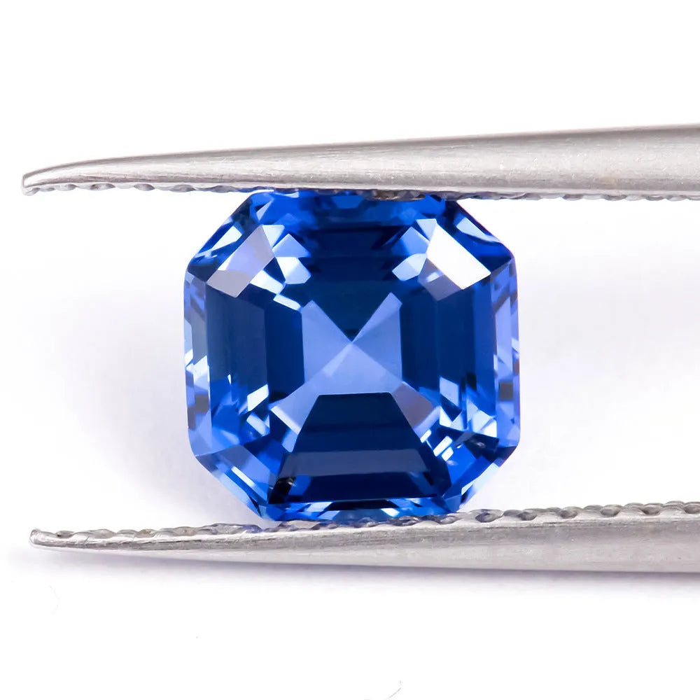 Royal blue love shaped tiara gemstones in various weights and shapes including heart, round, and pear styles