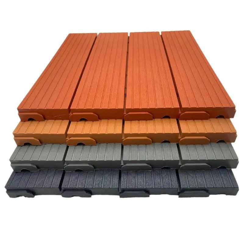 Pack of ten wood grain plastic interlocking floor tiles showing splicing edges.