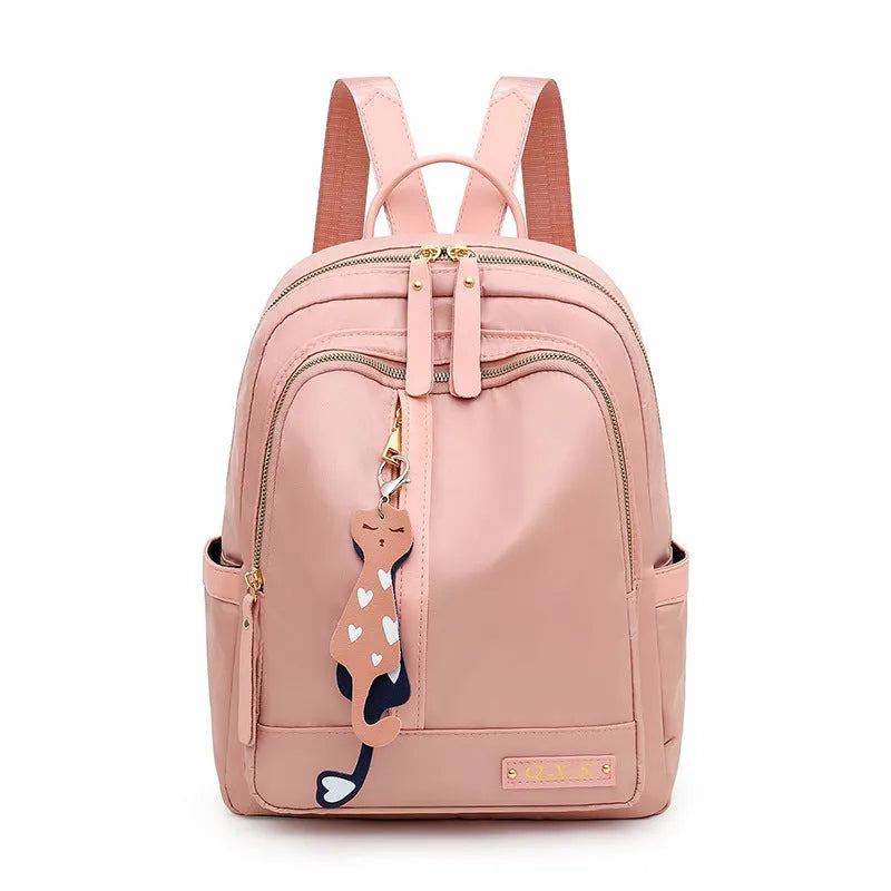 Women's black waterproof casual backpack with double shoulder straps and internal organisation compartments