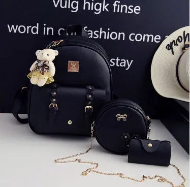 Women's three-piece backpack set with floral design including backpack, shoulder bag, and card holder