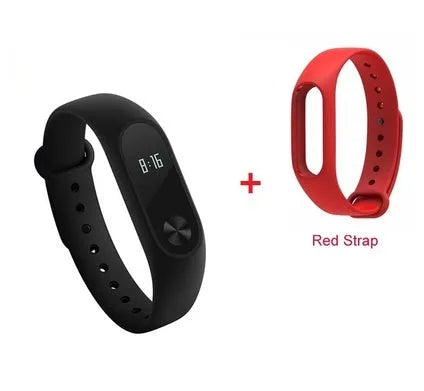 Black Xiaomi Mi Band 2 fitness tracker on wrist showing OLED display with heart rate data.
