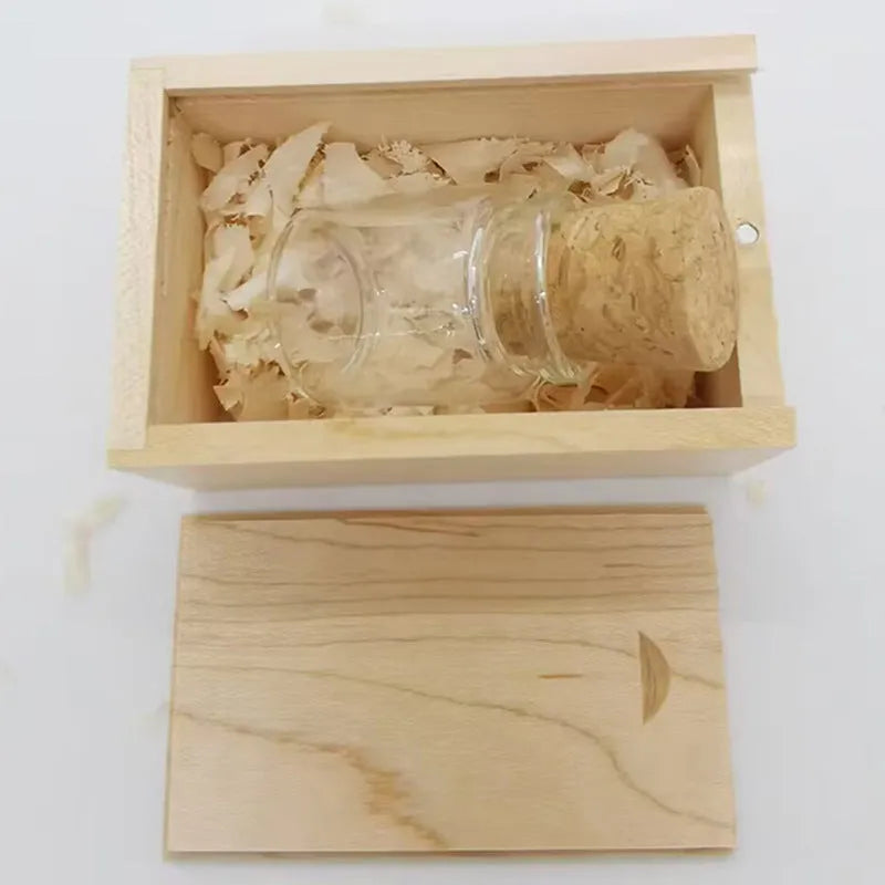 Clear glass drift bottle shaped USB flash drive with a wooden cork stopper, showing dimensions.