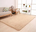 White plush rectangular area rug with a dotted non-slip bottom, shown at 40cm x 40cm size.