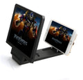 Black and white foldable 3D mobile phone screen amplifier stand on a table