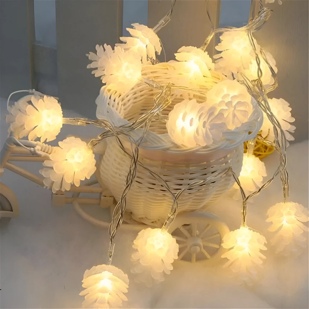 Battery-powered LED pine cone light string in warm white with plastic pine cone shells