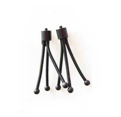 Small silver iron mini tripod with ball head, shown folded next to an iPhone for scale.
