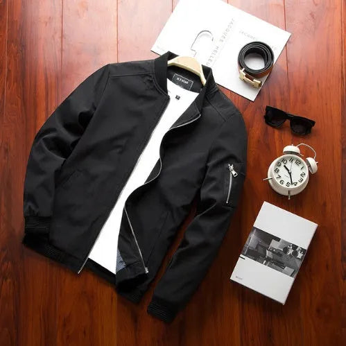 Men's slim fit casual jacket in a solid colour with a stand collar and side zippered pockets.
