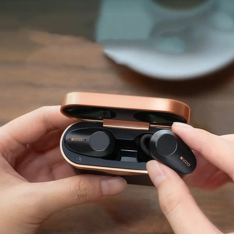Black wireless Bluetooth headset with twin earpieces and charging case featuring ANC and voice control