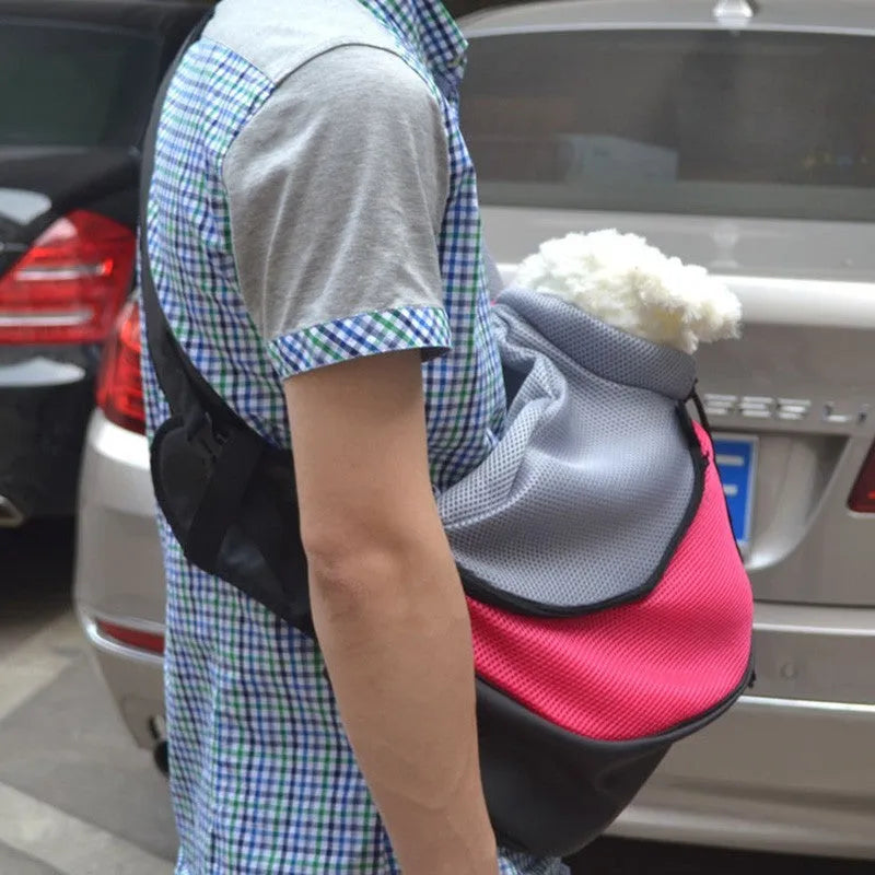 Polyester pet backpack carrier for small dog or cat, shown in blue colour with shoulder straps.