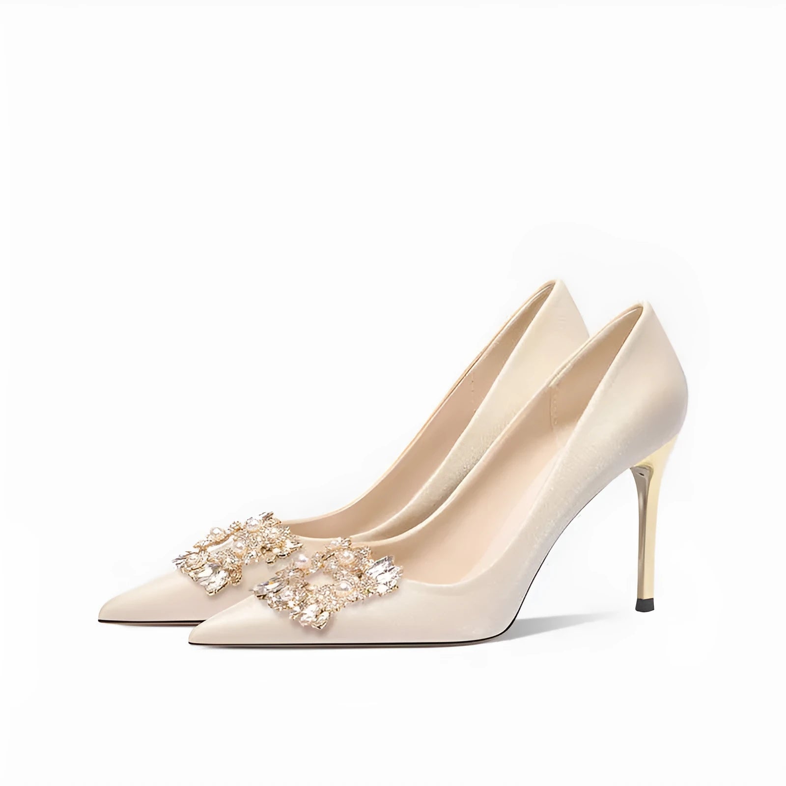 Rhinestone decorated pointed-toe bridal high heels on a white background.