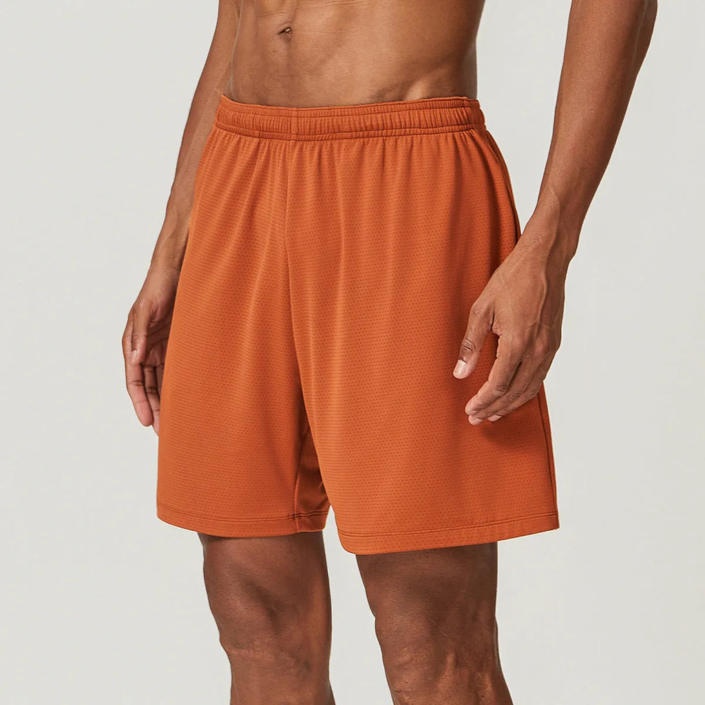 Men's double-layer running shorts in sky green, showing mid-waist fit and shorts length.