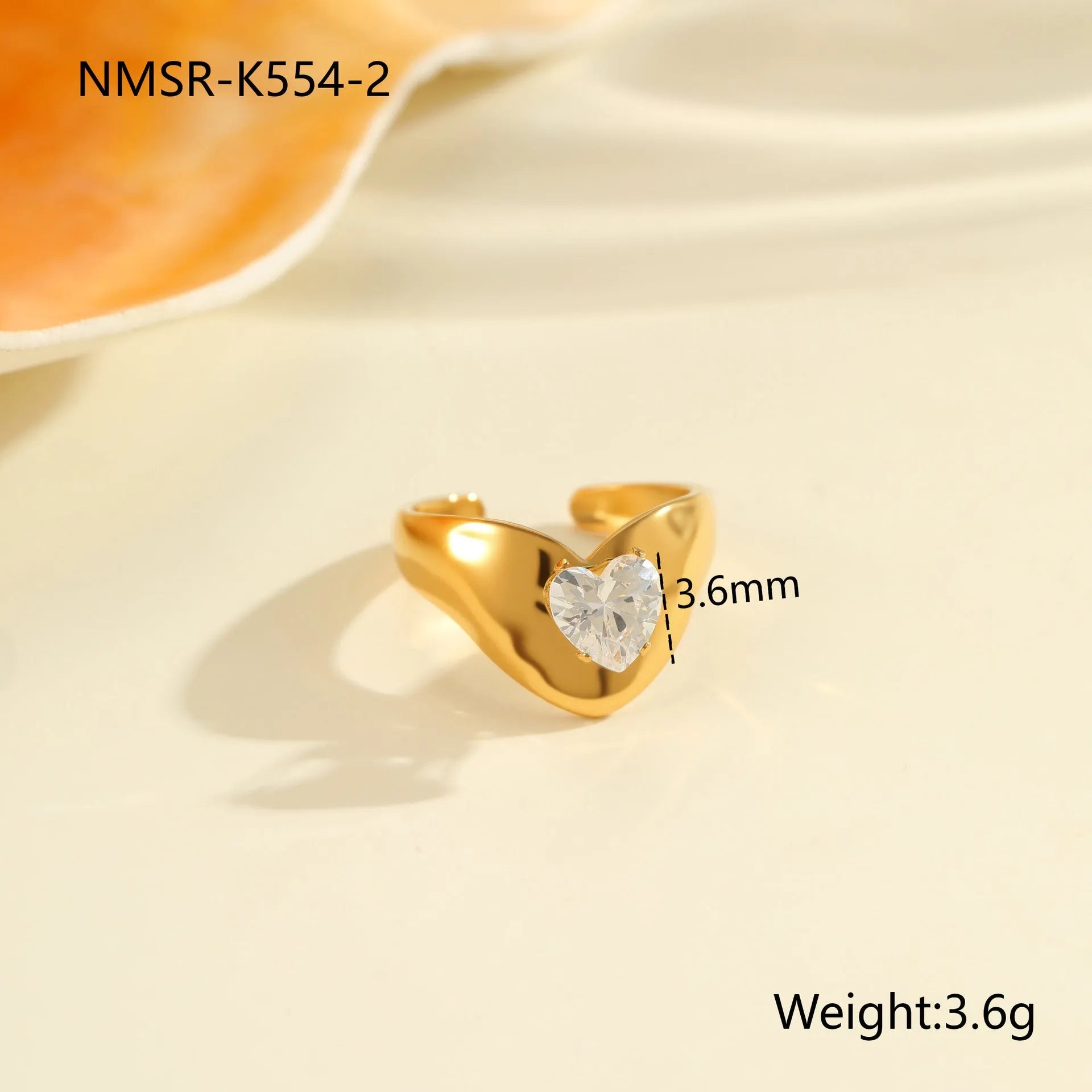 Geometric open mouth zircon ring showing adjustable design and electroplated finish