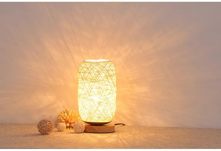 Sepak Takraw ball desk lamp made of brown hemp rope on a wooden base with USB cable