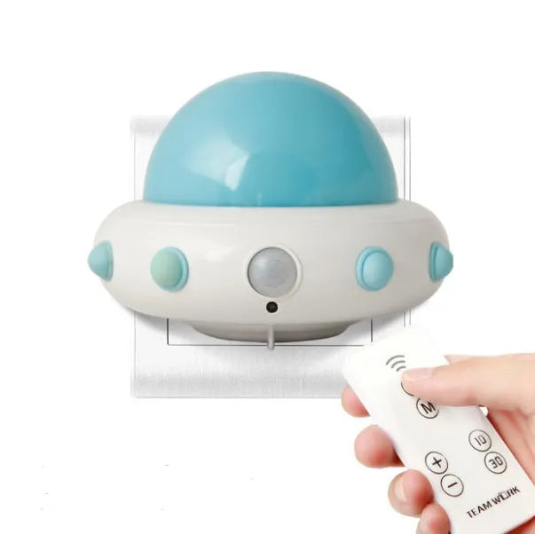Blue remote control UFO shaped bedside night light with dimensions 105mm by 76mm by 58mm