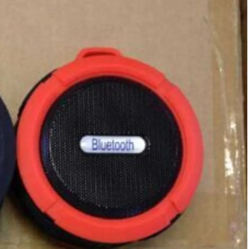 Portable waterproof Bluetooth speaker in five colours with bag clip and TF card slot