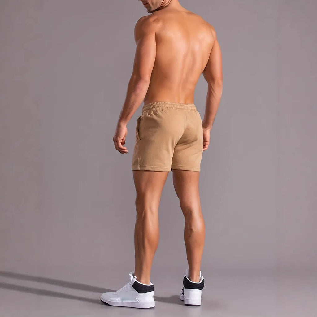 Men's khaki coconut print sports shorts with straight leg cut and elastic waistband